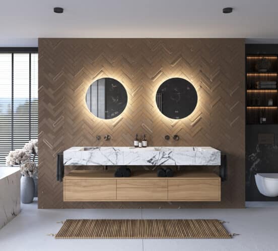 Beschik je over een breed badkamermeubel met 2 kranen of over 2 losse badkamermeubels? Denk dan eens aan 2 spiegels naast elkaar