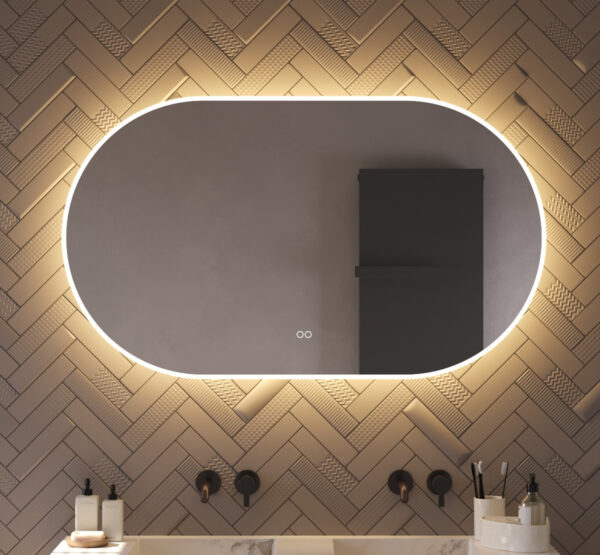 Deze trendy ovale spiegel voor in de badkamer is van alle gemakken voorzien, zoals: geïntegreerde verlichting en verwarming, dimfunctie, instelbare lichtkleur en dubbele touch bediening