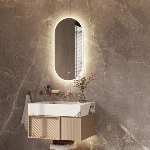Deze ovale design spiegel van 40 cm breed en 100 cm hoog is van alle gemakken voorzien, zoals: geïntegreerde directe + indirecte verlichting, spiegelverwarming, instelbare lichtkleur en een dimfunctie