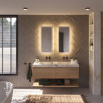 Beschik je over een breed badkamermeubel met 2 kranen of over 2 losse badkamermeubels? Denk dan eens aan 2 spiegels naast elkaar