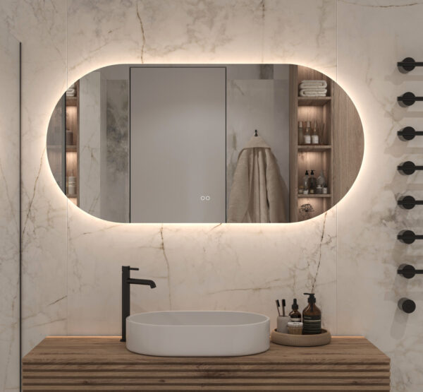 Deze mooi afgewerkte ovale badkamer spiegel is van alle gemakken voorzien, zoals dimbare verlichting, spiegelverwarming en een dubbele touch schakelaar met oa instelbare lichtkleur