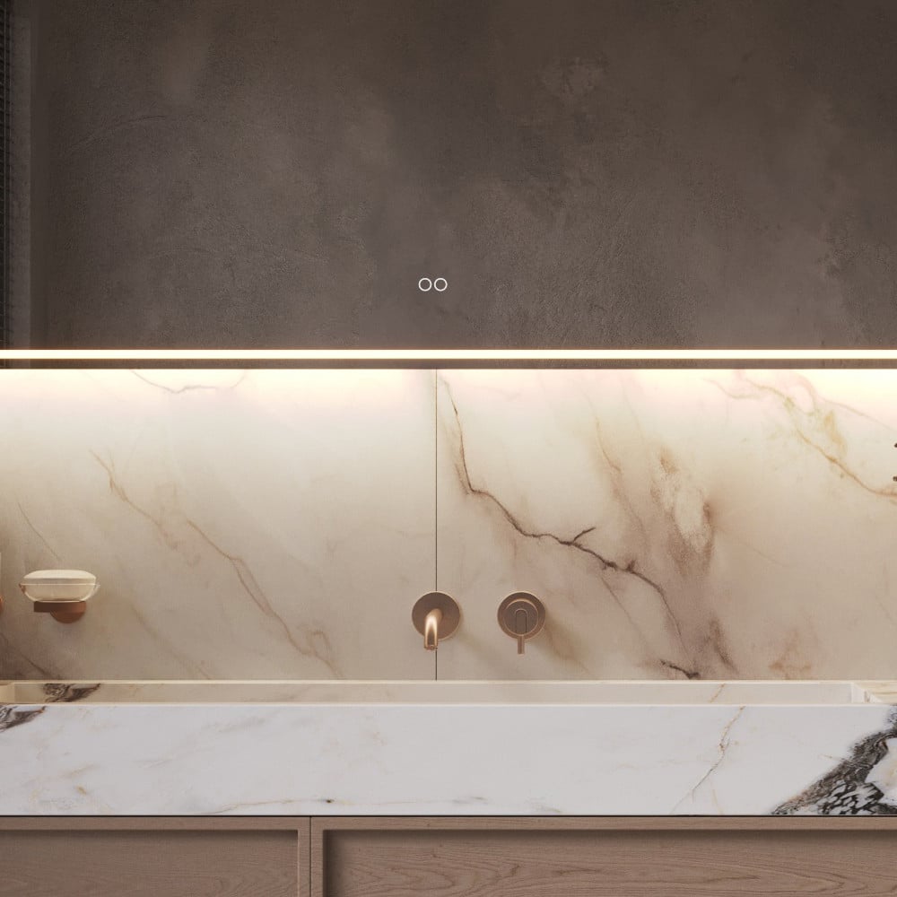 Uitgevoerd met een dubbele touch schakelaar in het spiegelglas; linker touch knop voor het gelijktijdig in- en uitschakelen van de verlichting en de verwarming, inclusief geïntegreerde dimfunctie voor de verlichting, rechter touch knop om traploos de gewenste kleur van de verlichting in te stellen