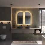 Beschik je over een breed badkamermeubel met 2 kranen of over 2 losse badkamermeubels? Denk dan eens aan 2 spiegels naast elkaar. Zie de link in de omschrijving voor de rechter spiegel.